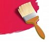 Paintbrush applying bright red paint in a smooth stroke.
