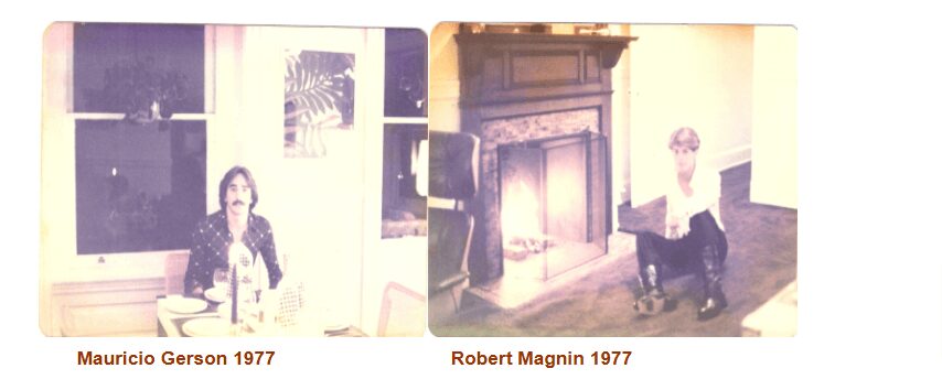 Old photograph showing a fireplace with a fire burning and a dog nearby.